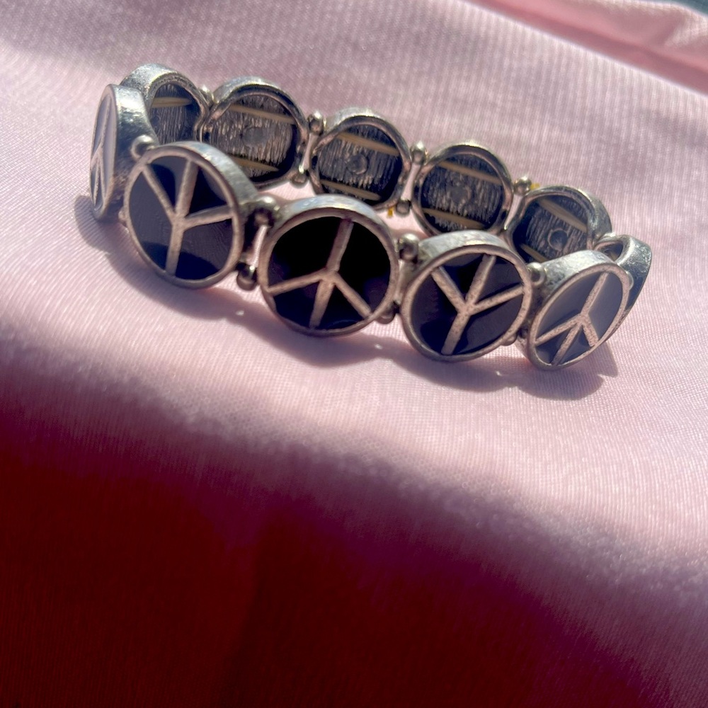 COPY - MUDD peace sign bracelet. Black and silver